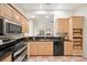 Kitchen with stainless steel appliances and granite countertops at 9101 New Oak Ln, Huntersville, NC 28078