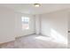 Well-lit bedroom with carpeted floor and a large window at 2161 Clifton Rd, Sherrills Ford, NC 28673