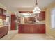 Kitchen with granite countertops and dark wood cabinets at 3028 Mt Vernon Dr, Gastonia, NC 28056