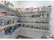 Well-organized pantry with ample shelving for storage at 13050 Regent Grove Ln, Huntersville, NC 28078