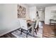 Elegant dining room with wood table and neutral colored chairs at 2215 Hedgecliff Rd # 2, Kannapolis, NC 28025