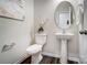 Small powder room with pedestal sink and toilet at 2215 Hedgecliff Rd # 2, Kannapolis, NC 28083