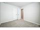 Spacious bedroom with double doors leading to a closet at 2345 Hedgecliff Rd # 15, Kannapolis, NC 28083