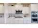 White kitchen with stainless steel appliances and ample counter space at 775 Kathy Dianne Dr, Fort Mill, SC 29707
