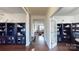 Bright hallway with built-in bookshelves and hardwood floors at 775 Kathy Dianne Dr, Fort Mill, SC 29707