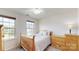Bedroom with a crib, dresser, and two windows at 775 Kathy Dianne Dr, Fort Mill, SC 29707