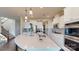 Modern kitchen with white cabinets, stainless steel appliances, and large island at 775 Kathy Dianne Dr, Fort Mill, SC 29707