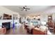 Open living space with hardwood floors, fireplace, and kitchen views at 775 Kathy Dianne Dr, Fort Mill, SC 29707
