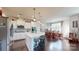 Eat-in kitchen with white cabinets, island, and stainless steel appliances at 775 Kathy Dianne Dr, Fort Mill, SC 29707