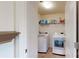 Laundry room with washer, dryer, and storage at 775 Kathy Dianne Dr, Fort Mill, SC 29707