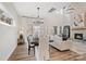 Bright dining room with hardwood floors and a view of the backyard at 19424 Bankhead Rd, Charlotte, NC 28278