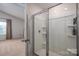 Clean and modern walk-in shower with glass enclosure at 1778 Bright Hope Ln, Dallas, NC 28034