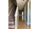 Entryway with hardwood floors and staircase leading upstairs at 6116 Heath Ridge Ct, Charlotte, NC 28210