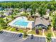 Aerial view of community pool, clubhouse, and surrounding homes at 775 Kathy Dianne Dr, Fort Mill, SC 29707