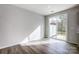 Bright dining area with hardwood floors and sliding glass doors leading to the backyard at 2235 Hedgecliff Rd # 4, Kannapolis, NC 28025