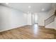 Open living room showcasing hardwood floors and staircase at 2235 Hedgecliff Rd # 4, Kannapolis, NC 28025