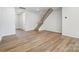 Hardwood floor living room with staircase and entryway at 2235 Hedgecliff Rd # 4, Kannapolis, NC 28025