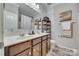 Bathroom with double vanity and updated finishes at 1909 Madeira Cir, Waxhaw, NC 28173