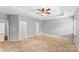 Bright main bedroom with neutral walls and carpet flooring at 141 Planters Dr, Statesville, NC 28677