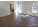 Bedroom with hardwood floors and en-suite bathroom access at 444 19Th Avenue Nw Cir, Hickory, NC 28601