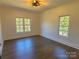 Bright bedroom featuring hardwood floors and large windows at 444 19Th Avenue Nw Cir, Hickory, NC 28601