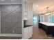 View of kitchen from entry hall with accent wall and built-in shelving at 444 19Th Avenue Nw Cir, Hickory, NC 28601