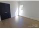 Well-lit bedroom with hardwood floors and a window with natural light at 444 19Th Avenue Nw Cir, Hickory, NC 28601