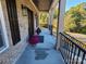 Front porch with brick columns and planters at 444 19Th Avenue Nw Cir, Hickory, NC 28601