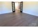 Spacious bedroom with hardwood floors and access to another room at 444 19Th Avenue Nw Cir, Hickory, NC 28601