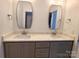 Double vanity bathroom with gray cabinets and quartz countertops at 444 19Th Avenue Nw Cir, Hickory, NC 28601
