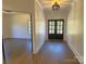 Bright entry hall with hardwood floors, leading to bedrooms and formal living areas at 444 19Th Avenue Nw Cir, Hickory, NC 28601