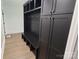 Black mudroom with bench, hooks, and additional storage at 444 19Th Avenue Nw Cir, Hickory, NC 28601