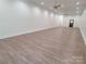 Spacious room with hardwood floors and ceiling fans at 444 19Th Avenue Nw Cir, Hickory, NC 28601