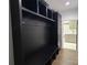 Mudroom with built-in bench, hooks, and storage cabinets at 444 19Th Avenue Nw Cir, Hickory, NC 28601