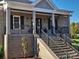Brick house with covered porch and black railings at 444 19Th Avenue Nw Cir, Hickory, NC 28601