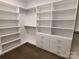 Spacious walk-in closet with ample shelving and drawers at 444 19Th Avenue Nw Cir, Hickory, NC 28601