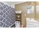 Clean bathroom with shower/tub, shelving, and vanity at 601 Hasty St, Marshville, NC 28103