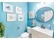 Stylish bathroom with coastal decor and updated vanity at 114 Silverspring Pl, Mooresville, NC 28117