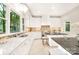 Modern kitchen with white cabinets, granite countertops and breakfast bar at 10250 Barringer Ct, Mount Pleasant, NC 28124