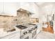 Gourmet kitchen with stainless steel appliances and custom cabinetry at 10250 Barringer Ct, Mount Pleasant, NC 28124