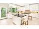 Bright kitchen with white cabinets, granite countertops, and large windows at 10250 Barringer Ct, Mount Pleasant, NC 28124
