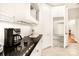 Kitchen features granite countertops, stainless steel appliances, and ample storage at 10250 Barringer Ct, Mount Pleasant, NC 28124