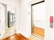 Modern elevator with wood flooring and access to kitchen at 10250 Barringer Ct, Mount Pleasant, NC 28124