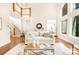 Light and airy living room with hardwood floors and large windows at 10250 Barringer Ct, Mount Pleasant, NC 28124
