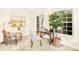 Home office with built-in desk and large windows offering natural light at 10250 Barringer Ct, Mount Pleasant, NC 28124