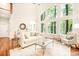 Spacious living room with hardwood floors and wall of windows at 10250 Barringer Ct, Mount Pleasant, NC 28124
