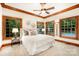 Spacious bedroom with wood accents and large windows at 10250 Barringer Ct, Mount Pleasant, NC 28124