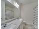 Bathroom with double sinks, shower, and bathtub at 2716 Manor Stone Way, Indian Trail, NC 28079