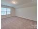 Bedroom with window, closet and carpet flooring at 2716 Manor Stone Way, Indian Trail, NC 28079