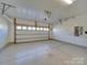 Spacious garage with automatic door opener and epoxy floor at 2716 Manor Stone Way, Indian Trail, NC 28079